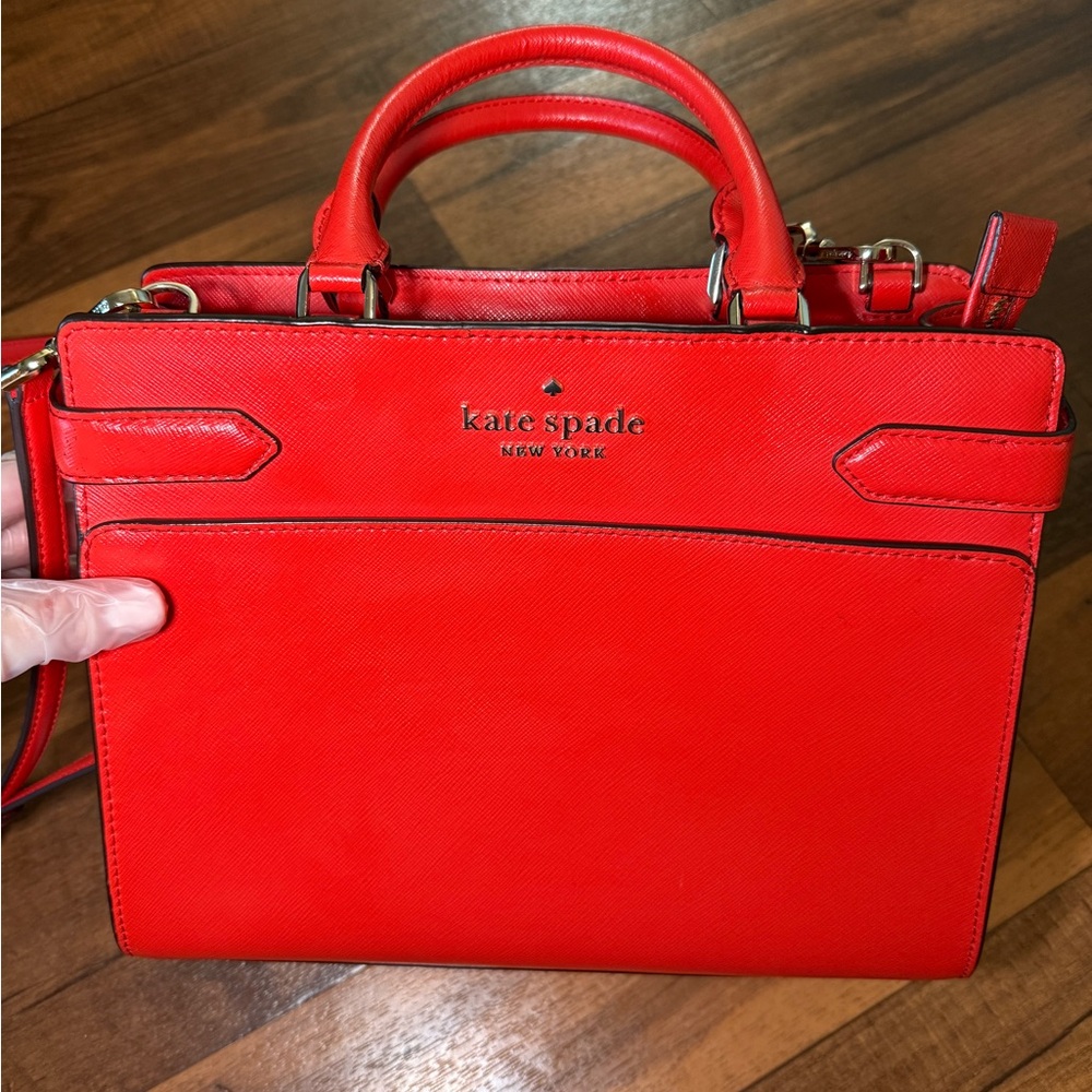 Red Kate Spade leather tote bag